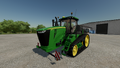 In-game view of John Deere 9RT Series tracked tractor