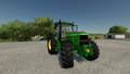In-game view of John Deere 7810 row-crop tractor