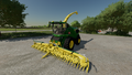 In-game view of John Deere 9000 Series forage harvester with a 360 Plus corn chopper attached