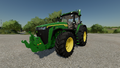In-game view of John Deere 8R Series row crop tractor