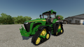 In-game view of John Deere 8RX Series 4-tracked row-crop tractor